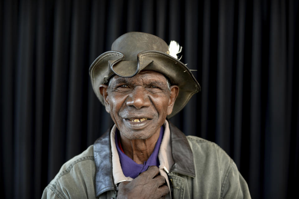 Australian Indigenous actor David Gulpilil, winner of the Red Ochre, the major award at the 6th National Indigenous Arts Awards, poses for a photograph at The Sydney Opera House, Sydney on Monday, May 27, 2013. Gulpilil has died of lung cancer, a government leader said on Monday, Nov. 29, 2021. He was 68 years old. (Dan Himbrechts/AAP Image via AP)