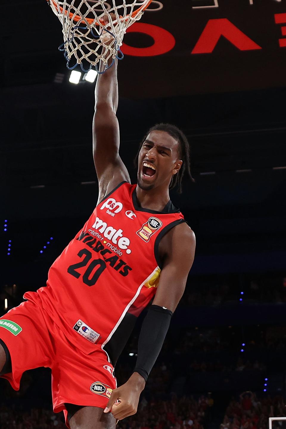 Alex Sarr dunks during a game between Perth Wildcats and Tasmania Jackjumpers at RAC Arena in Perth, Australia on March 8, 2024.