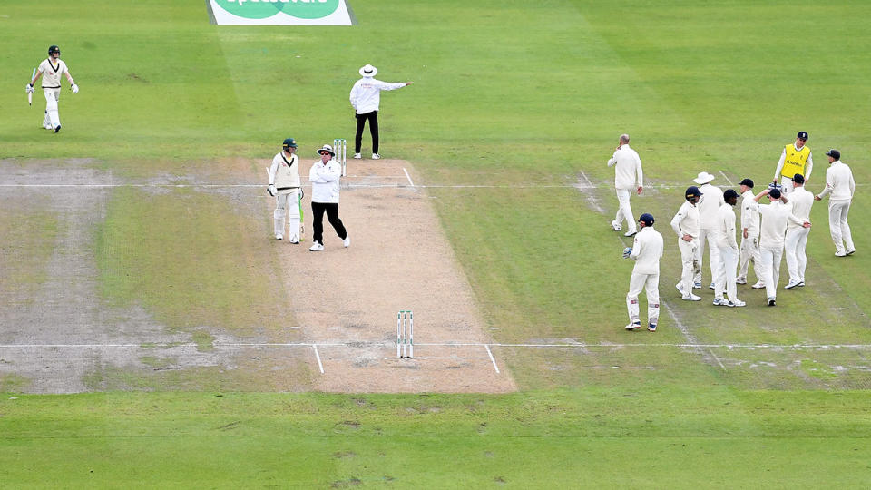 Steve Smith, pictured here walking back to the crease after the blunder.