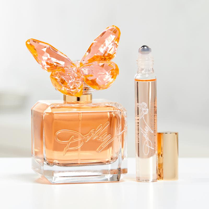 perfume bottle with butterfly top