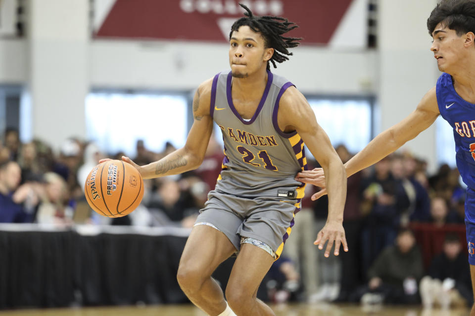 FILE - Camden's D.J. Wagner (21) plays against Bishop Gorman during a high school basketball game at the Hoophall Classic, Monday, Jan. 16, 2023, in Springfield, Mass. Wagner is positioned to be one of the top NBA draft prospects for next year. (AP Photo/Gregory Payan, File)