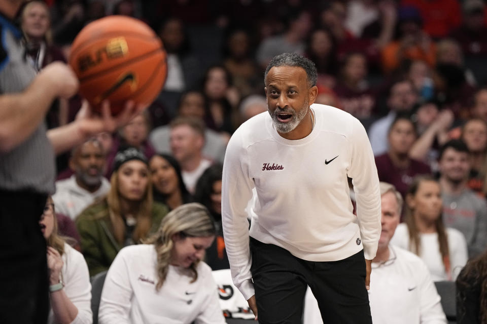 Virginia Tech head coach Kenny Brooks reacts during the first half of an NCAA women's college basketball game against Iowa Thursday, Nov. 9, 2023, in Charlotte, N.C. (AP Photo/Chris Carlson)