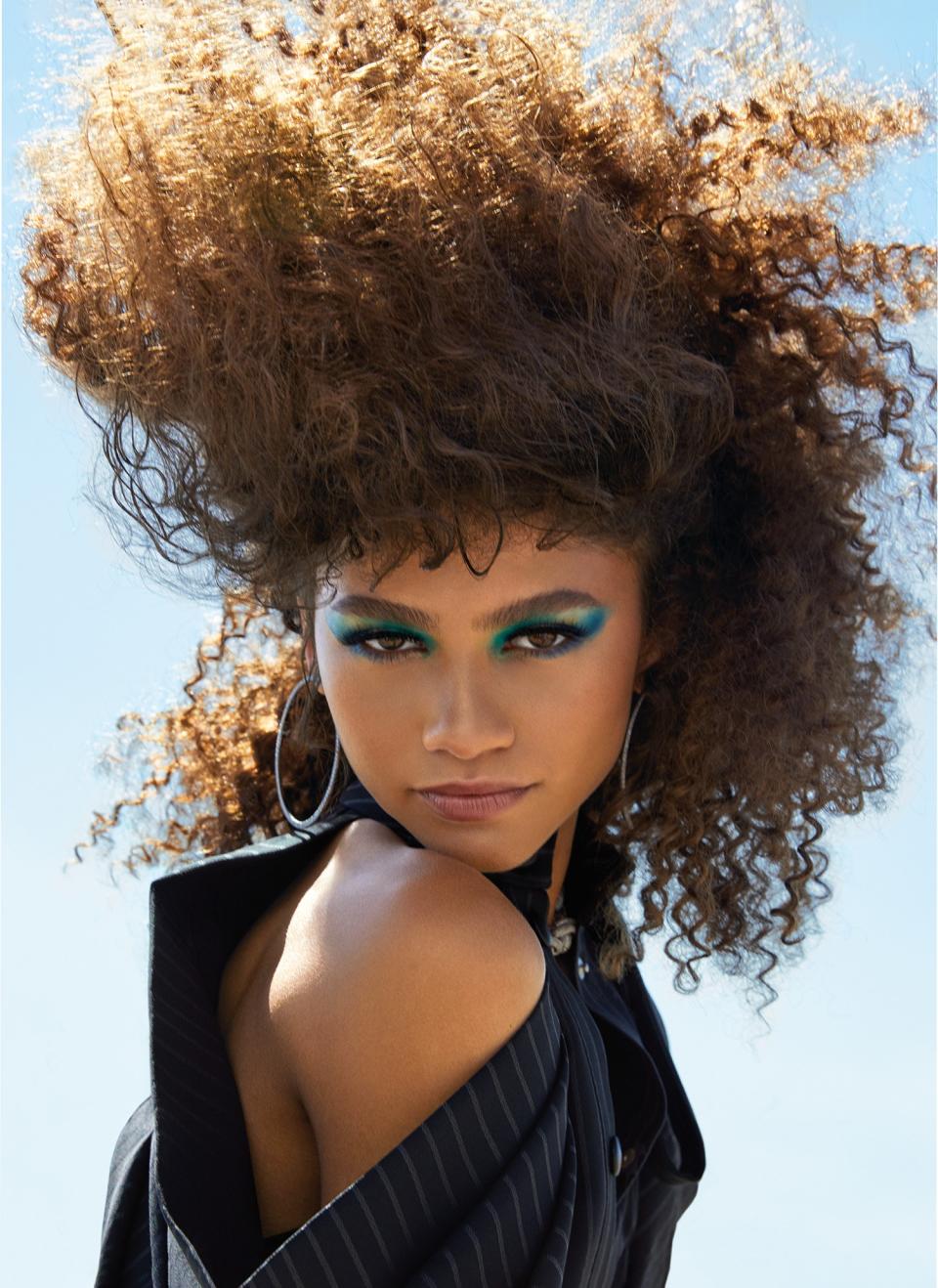 <cite class="credit">Makeup colors: Color Design Eyeshadow Palette in Teal Fury and Brow Define Pencil in Caramel by Lancôme.</cite>