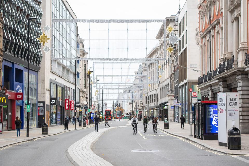 <p>A quiet Oxford Street </p> (PA)