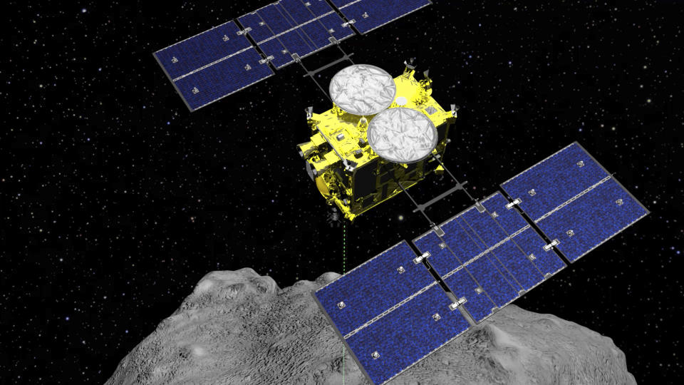 ARCHIVO - Esta imagen gráfica distribuida por la Agencia de Exploración Aeroespacial de Japón (JAXA) muestra la sonda espacial Hayabusa2 sobre el asteroide Ryugu. (ISAS/JAXA via AP, File)