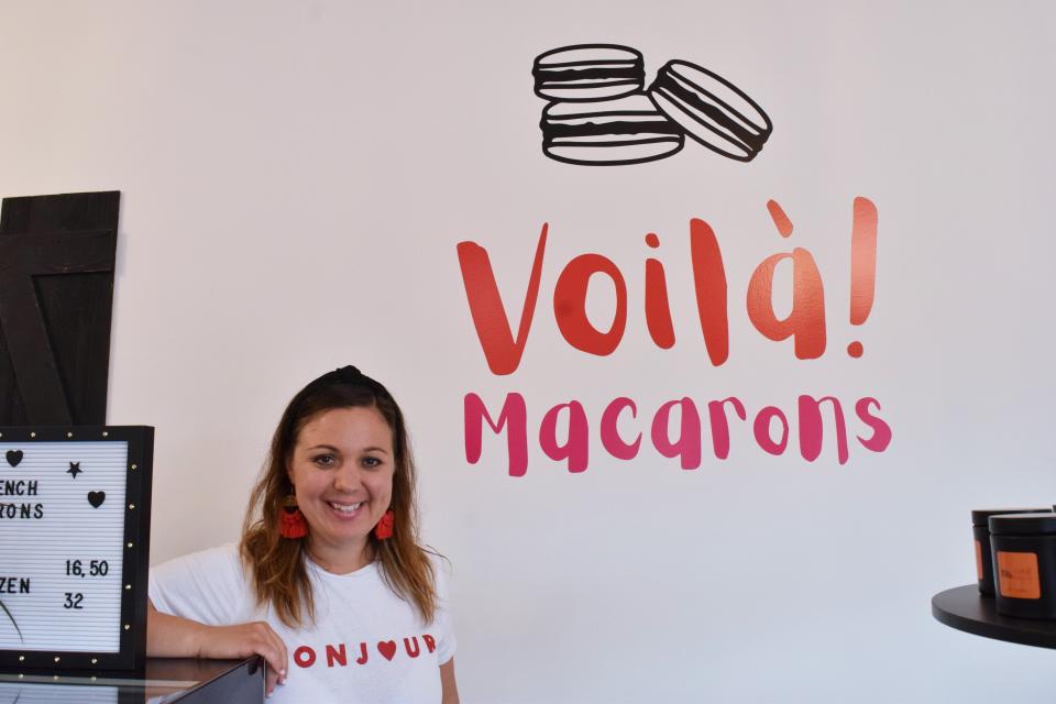 Diana Natale stands in her shop, Voilà! Macarons, on July 1, 2022. Natale opened the shop in early May.