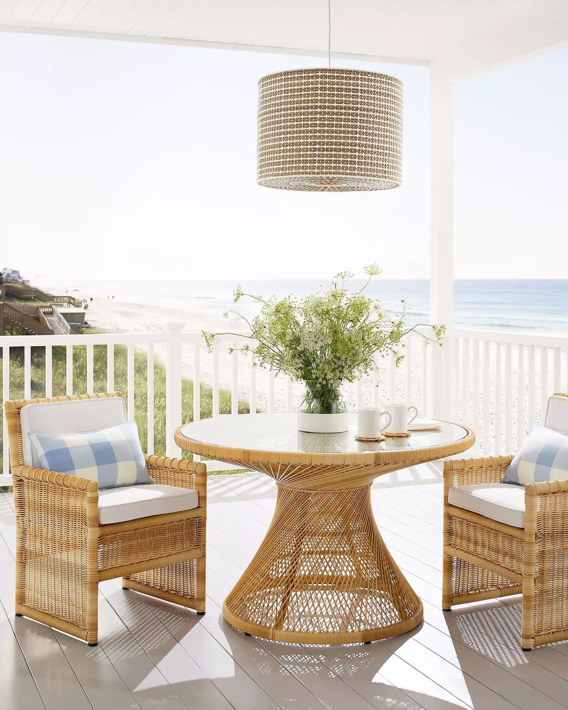 a table and chairs on a balcony