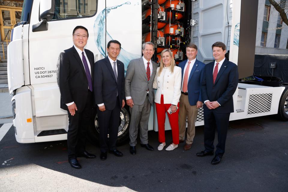 (from left) Jim Park, senior VP commercial vehicle and hydrogen business development, Hyundai Motor North America, José Muñoz, president and global COO, Hyundai Motor Company, and president and CEO, Hyundai and Genesis Motor North America, Georgia Governor Brian Kemp, First Lady Marty Kemp, Pat Wilson, commissioner of the Georgia Department of Economic Development and Trip Tollison, president and CEO, Savannah Economic Development Authority, pose in front of Hyundai’s XCIENT fuel cell tractor at Hyundai Day at the Georgia State Capitol, Feb. 26, 2024.