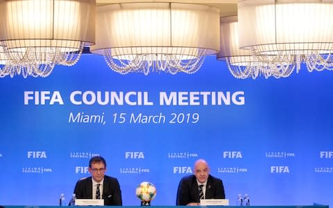 Fifa chief communications officer Fabrice Jouhaud (left) with Fifa president Gianni Infantino (right) - Credit: ap