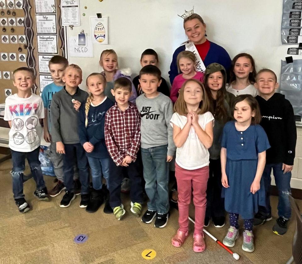 Aliah Williamson stands an elementary school class, to which she made a presentation about veterans as e part of her Heroes of Today senior project at River View High School.