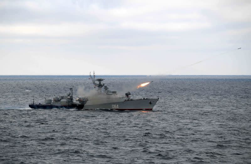 Russian anti-submarine corvette Muromets fires during the joint drills of the Northern and Black Sea fleets, attended by Russian President Vladimir Putin, in the Black Sea, off the coast of Crimea