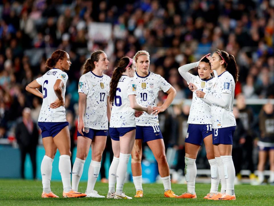 US Women's National Team players chat during their group stage match against Portugal.