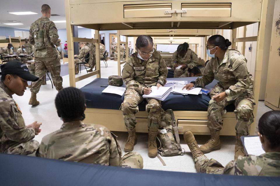 FILE - Students enlisted in the new Army prep course work together in barracks at Fort Jackson in Columbia, S.C., Aug. 26, 2022. (AP Photo/Sean Rayford, File)