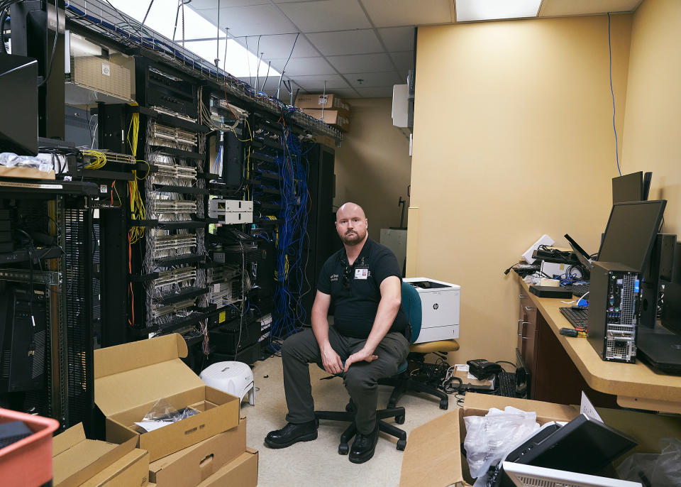 Facilities assistant James Temple in the newly upgraded computer systems center at Clinch Memorial Hospital.<span class="copyright">Stacy Kranitz for TIME</span>