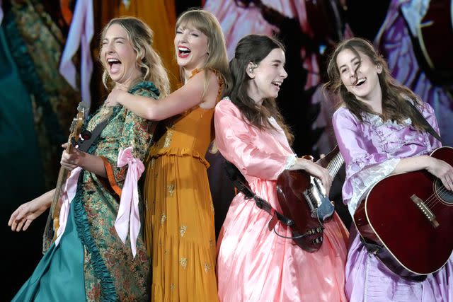 <p>Jeff Kravitz/TAS23/Getty Images for TAS Rights Management</p> Taylor Swift performing with the Haim sisters in July 2023