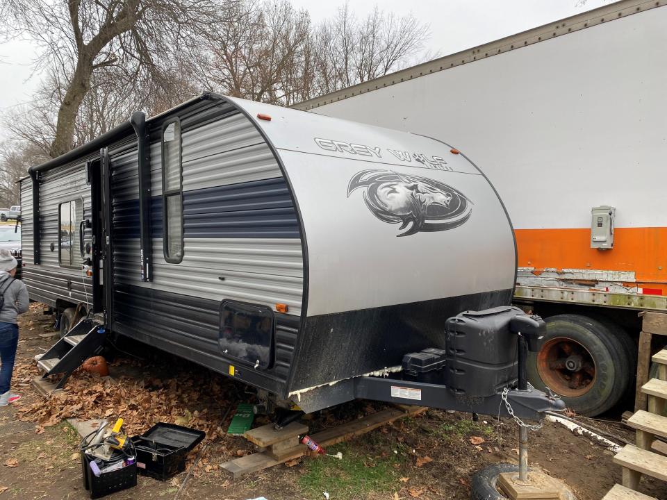 A trailer being dismantled for parts.