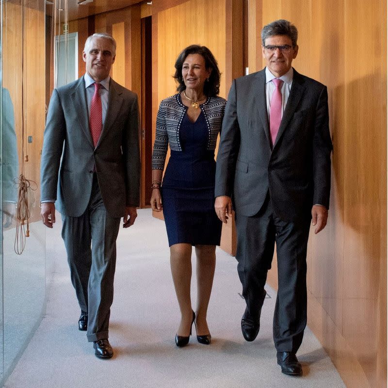 FILE PHOTO: Andrea Orcel, Banco Santander chairwoman Ana Botin and Banco Santander CEO Jose Antonio Alvarez are seen together at a meeting