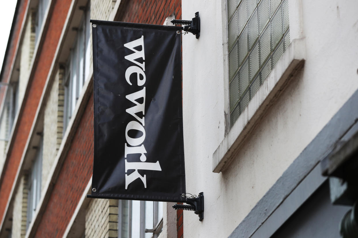 Signage outside the co-working office space group, WeWork, at Chapel Street, London. (Photo by Jonathan Brady/PA Images via Getty Images)