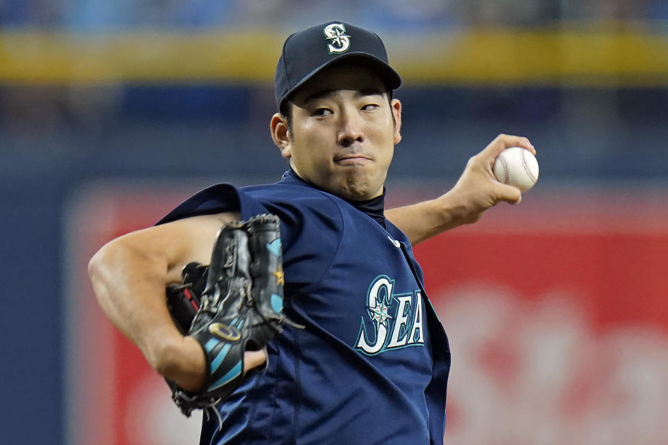 Seattle Mariners starting pitcher Yusei Kikuchi, of Japan, delivers to the Tampa Bay Rays during the first inning of a baseball game Tuesday, Aug. 3, 2021, in St. Petersburg, Fla. (AP Photo/Chris O'Meara)