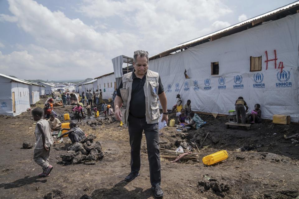 OCHA (United Nations Office for the Coordination of Humanitarian Affairs) head and representative Ramesh Rajasingham visits people displaced by the ongoing fighting between Congolese forces and M23 rebels in a camp on the outskirts of Goma, Democratic Republic of Congo, Wednesday, March 13, 2024. (AP Photo/Moses Sawasawa)