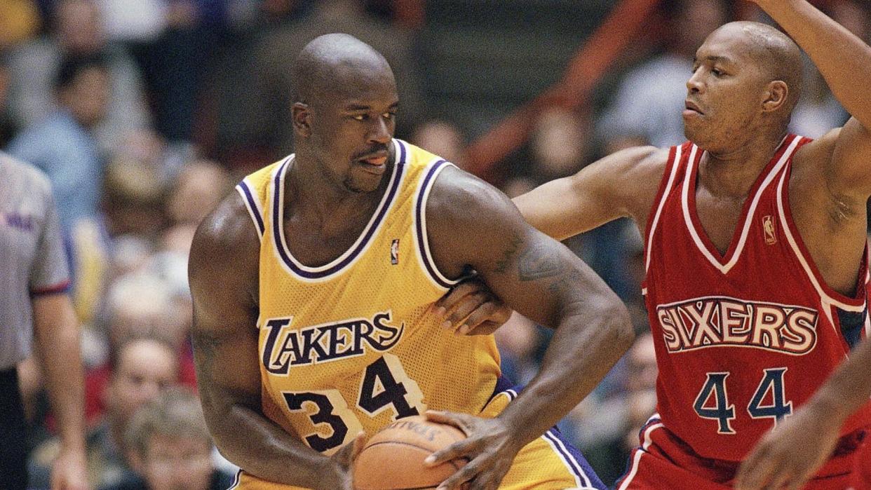 Derrick Coleman, Shaquille O'Neal Philadelphia 76ers' Derrick Coleman, guards against Los Angeles Lakers' Shaquille O'Neal during the first period at the Forum in Inglewood, California, .