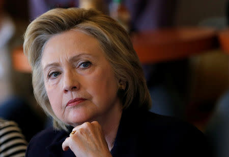 U.S. Democratic presidential candidate Hillary Clinton listens to steelworkers during a campaign event in Ashland, Kentucky, United States, May 2, 2016. REUTERS/Jim Young