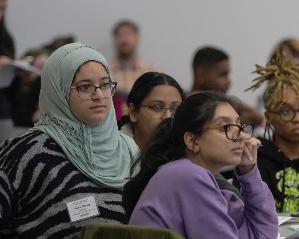 Nancy Almady of Spackenkill High School sits with class mates as students take part in a Pathways to Civic Engagement conference at the FDR Presidential Library and Museum in Hyde Park on Tuesday, December 6, 2022.