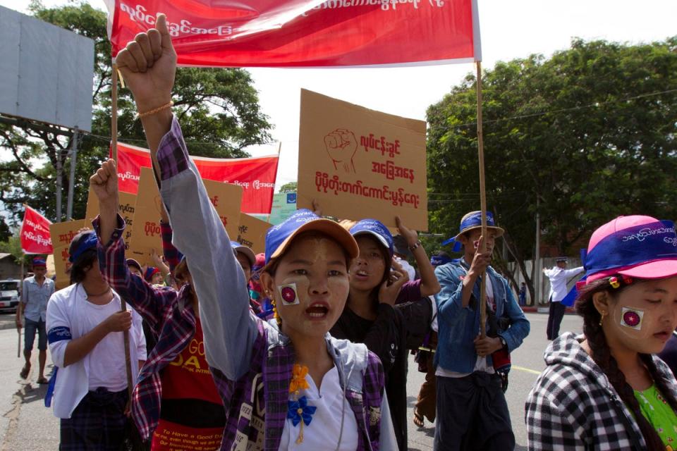 File: Myanmar workers, mostly from garment and shoe factories, take part in a May Day march in Yangon (Copyright 2018 The Associated Press. All rights reserved.)