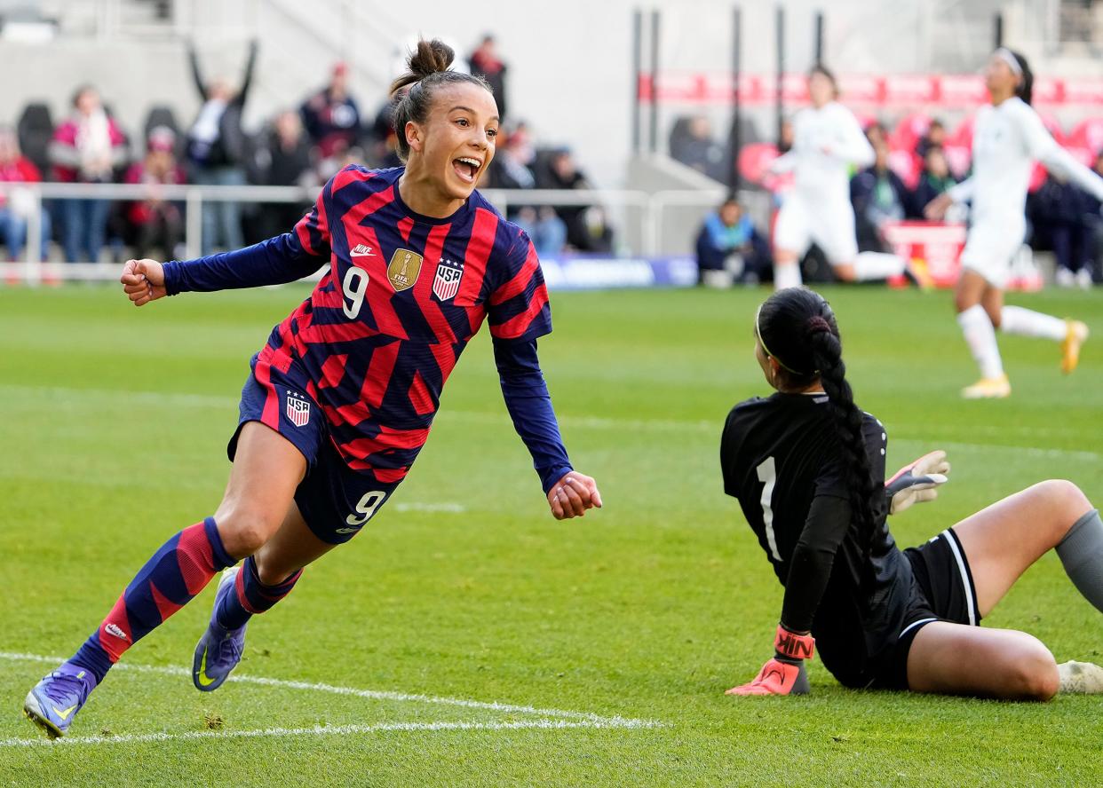 United States forward Mallory Pugh (9) celebrates her goal against Uzbekistan goalkeeper Laylo Tilovova (1) during the 1st half of their game at Lower.com Field in Columbus, Ohio on April 9, 2022. 