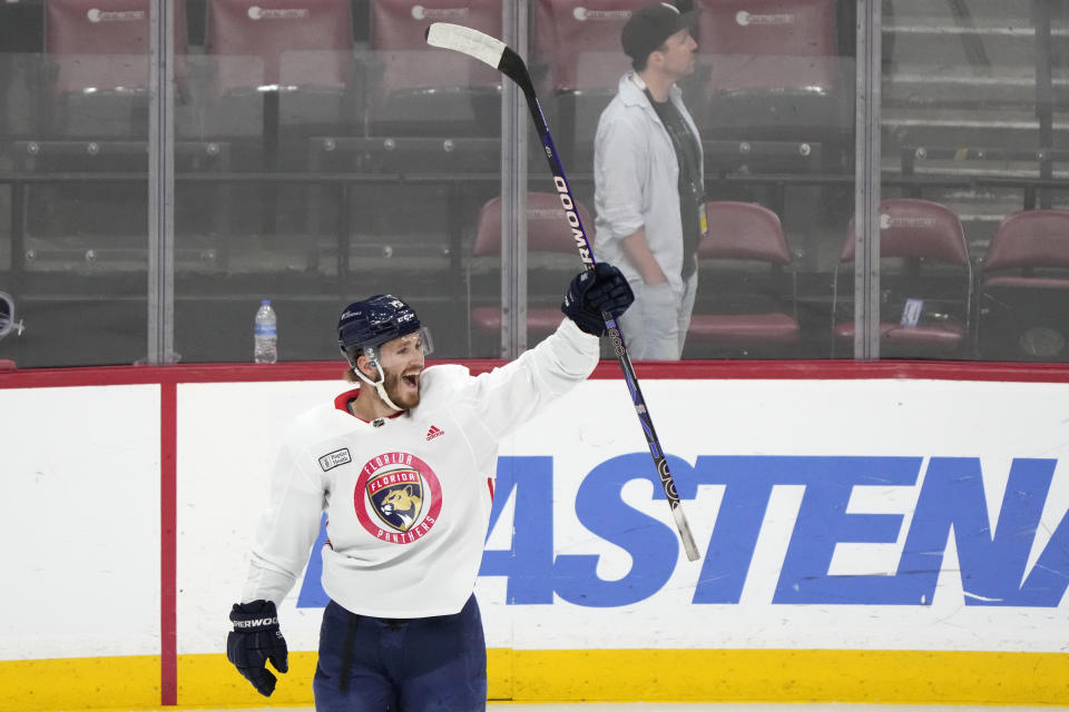 Florida Panthers left wing Matthew Tkachuk cheers during a hockey practice before Media Day for the Stanley Cup Finals, Friday, June 7, 2024, in Sunrise, Fla. The Panthers take on the Edmonton Oilers in Game 1 on Saturday in Sunrise. (AP Photo/Wilfredo Lee)