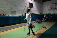 Wisam Sami, a 29 year-old Iraqi refugee, pauses during his wheelchair fencing training at Apostolos Nikolaidis stadium in Athens