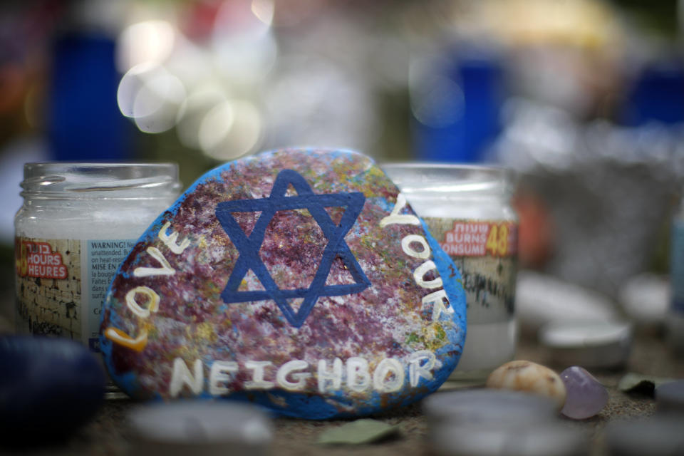 A painted rock found Wednesday, Oct. 31, 2018, was part of a makeshift memorial outside the Tree of Life Synagogue in the Squirrel Hill neighborhood of Pittsburgh. (Photo: ASSOCIATED PRESS)