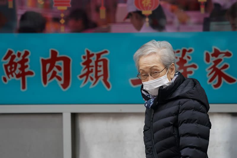 Chinatown residents wear surgical masks in New York City