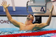 Benoit Huot of Canada celebrates winning the gold in the Men's 200m Individual Medley - SM10 final on day 1 of the London 2012 Paralympic Games at Aquatics Centre on August 30, 2012 in London, England. (Photo by Hannah Johnston/Getty Images)