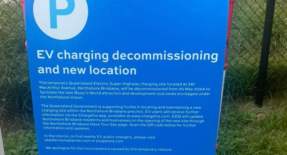 A sign posted at the Queensland Electric Super Highway charging site located at 281 MacArthur Avenue, which has been decommissioned to make way for a new Blue theme park. 