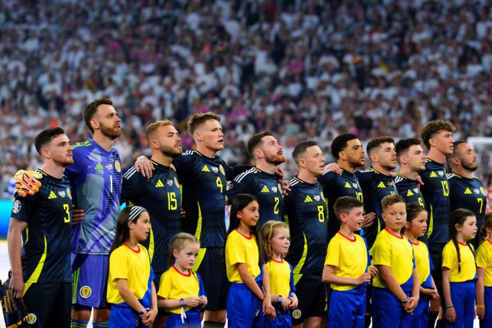 The Scotland team lines-up for Flower of Scotland <i>(Image: PA)</i>