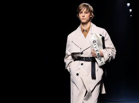 A model presents a creation by designer Clare Waight Keller as part of her Spring/Summer 2019 women's ready-to-wear collection show for fashion house Givenchy during Paris Fashion Week in Paris, France, September 30, 2018. REUTERS/Gonzalo Fuentes