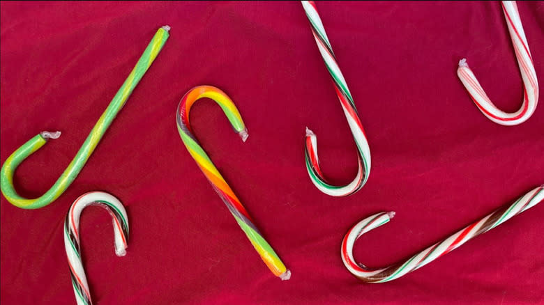 Candy canes on red background