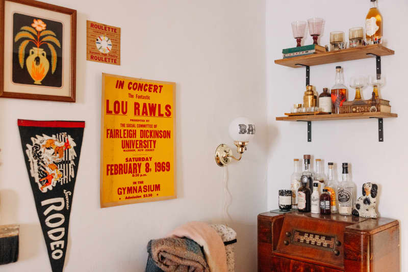 Bar area in corner of white living room.