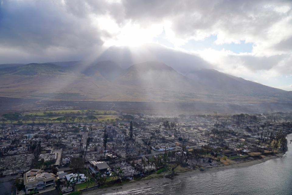 Wildfire wreckage is seen Thursday, 10 Aug 2023, in Lahaina, Hawaii. The search of the wildfire wreckage on the Hawaiian island of Maui on Thursday revealed a wasteland of burned out homes and obliterated communities. (Copyright 2023 The Associated Press. All rights reserved)