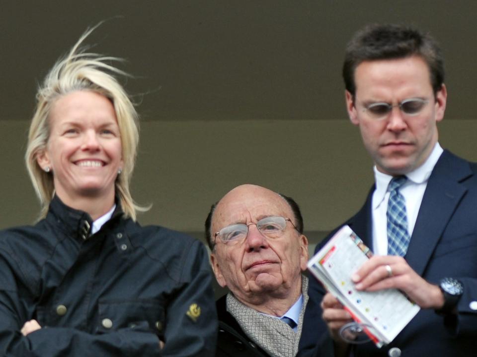 Elisabeth Murdoch, with her brother James and her father Rupert.
