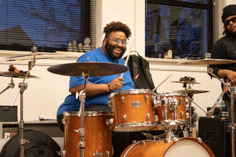 Drummer Anthony Tyler rehearses with Minor Element at First Congregational Church in Battle Creek on Tuesday, March 30, 2023.