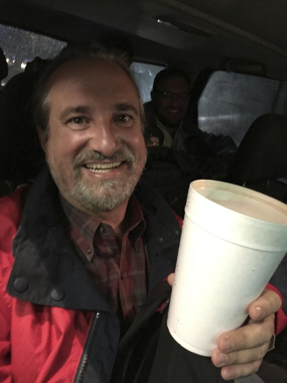 Fernando Gonzalez smiles into the camera during earthquake coverage in Mexico City, Sept. 21, 2017. Gonzalez, 60, who spent decades covering and directing major stories for The Associated Press across Latin America, died in Havana, Cuba late Sunday, Nov. 21, 2021 when he fell suddenly ill at his home. (AP Photo/Enric Marti)