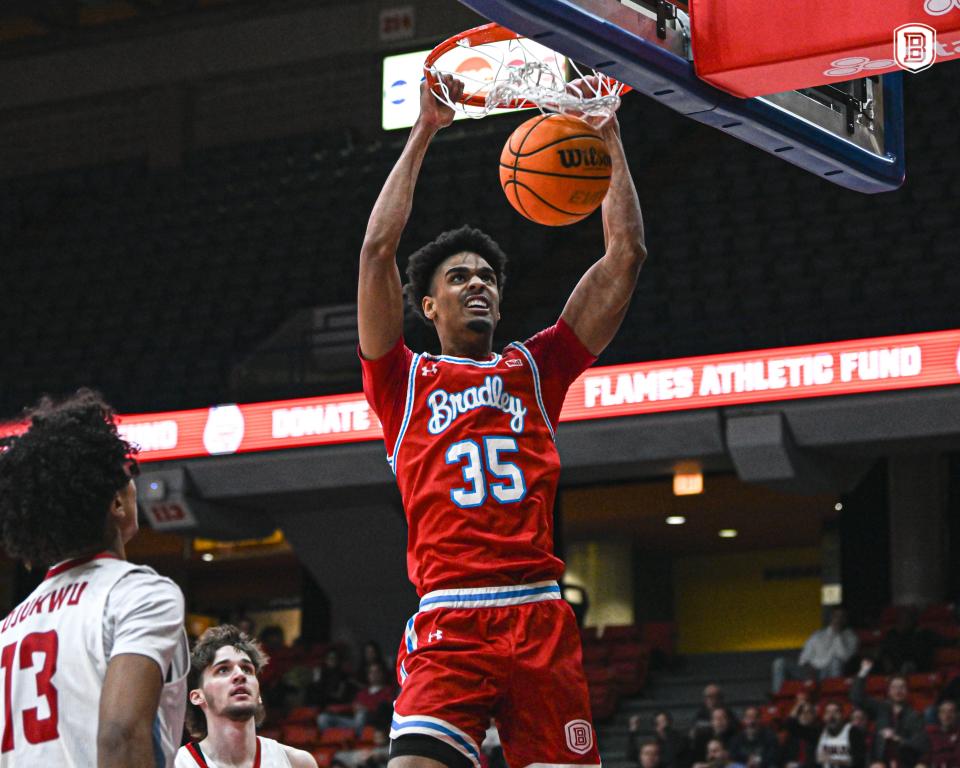 Bradley's Darius Hannah dunks during a Missouri Valley Conference men's basketball game against Illinois-Chicago on Saturday, Jan. 13, 2024, in Chicago.