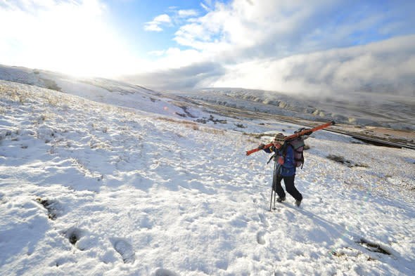 A Skier makes her way up the hill to the Yad Moss Ski slopes near Garrigill, Cumbria after overnight snow.