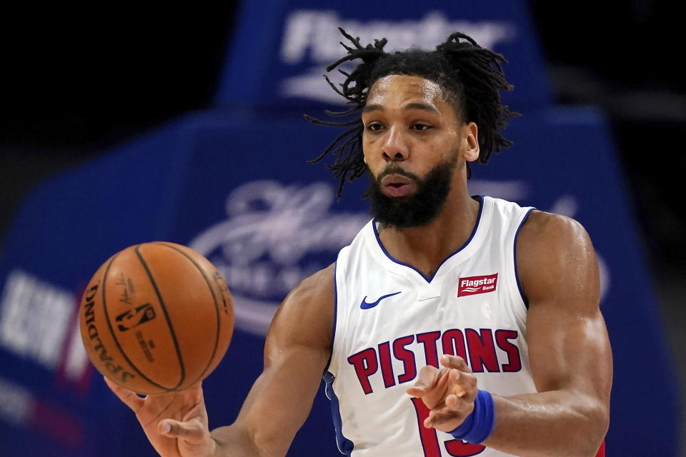 FILE - In this Dec. 11, 2020, file photo, Detroit Pistons center Jahlil Okafor passes the ball during the first half of a preseason NBA basketball game in Detroit. The Detroit Pistons acquired veteran center DeAndre Jordan in a multiplayer trade with the Brooklyn Nets on Saturday, Sept. 4, 2021. The Pistons also received four second-round picks and cash considerations from the Nets in exchange for forward Sekou Doumbouya and center Jahlil Okafor. (AP Photo/Carlos Osorio, File)