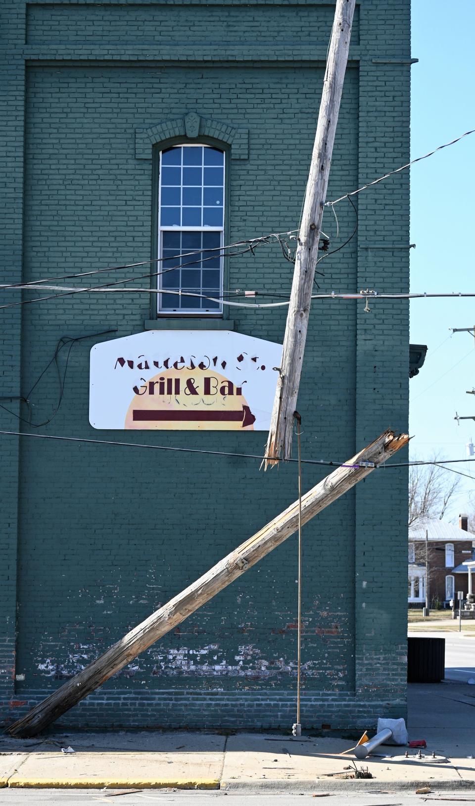 The power pole broke cutting off some service in downtown Bronson.