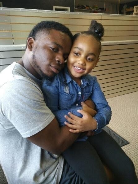 This file photo provided by the family of Michael Dean shows Dean with his daughter Te'yana. Dean was killed Dec. 2, 2019, in Temple, Texas, located 70 miles northeast of Austin. Carmen DeCruz, a Central Texas police officer, was charged Monday, Feb. 10, 2020, with manslaughter for the fatal shooting of Dean, an unarmed man, during a traffic stop, officials said. (Courtesy from Michael Dean Family via AP, File)