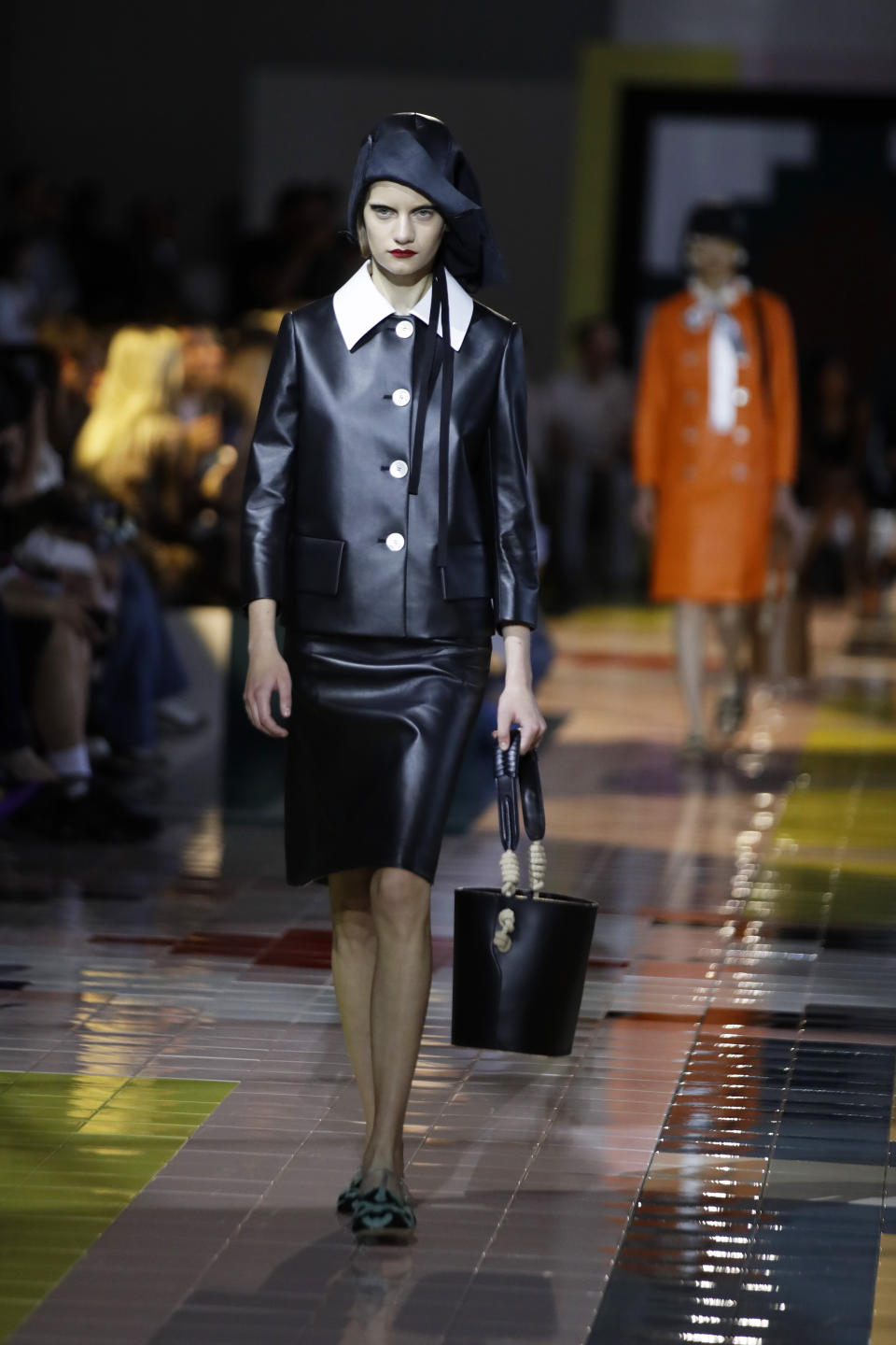 A model wears a creation as part of the Prada Spring-Summer 2020 collection, unveiled during the fashion week, in Milan, Italy, Wednesday, Sept. 18, 2019. (AP Photo/Luca Bruno)