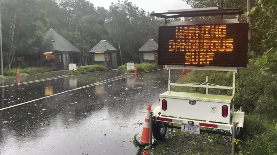 A warning sign is displayed on Park Loop Rd. along shoreline closure at Acadia National Park in Maine on Saturday, Sept. 16, 2023.  / Credit: Robert Bumsted / AP